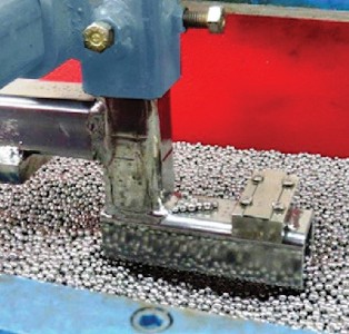 vibratory peening process